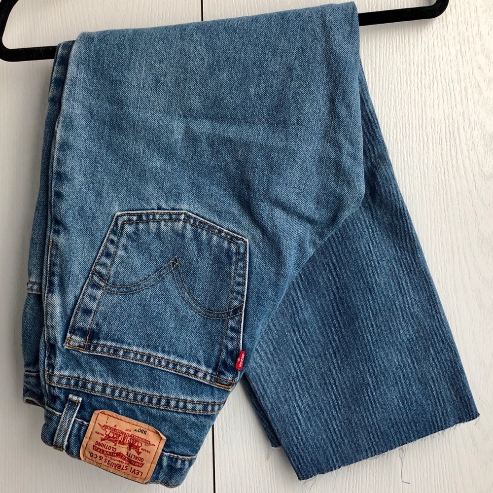 VINTAGE LEVI’S 550 RAW HEM DENIM JEANS
